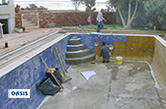 Albufeira, 2008 - Recuperação de piscina colocando novo revestimento interior, degraus de acesso, sistema de natação contra-corrente e hidromassagem